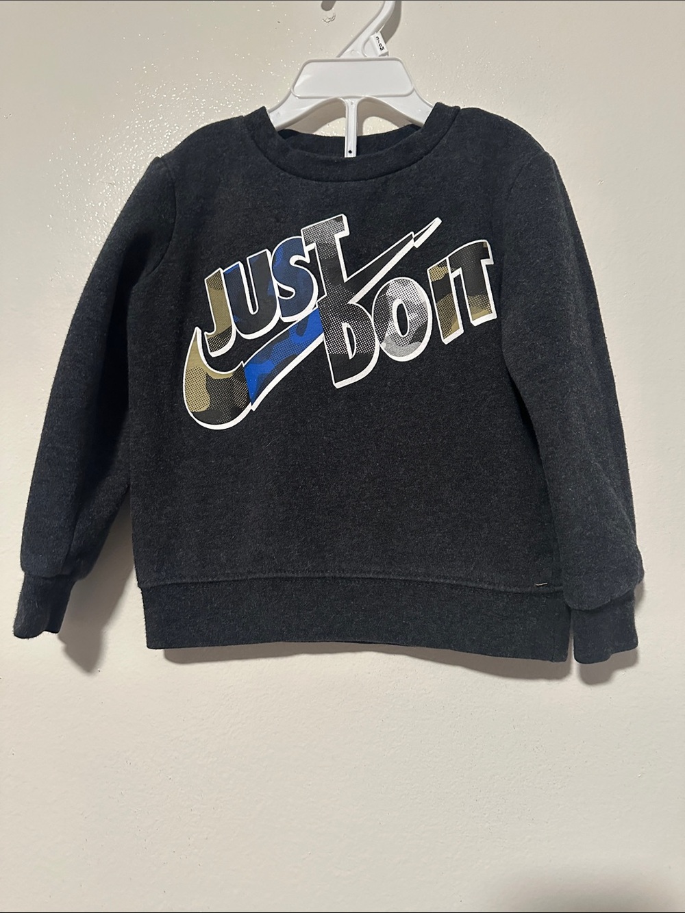 Nike Kids Black Sweatshirt with Multicolor "Just Do It" Graphic